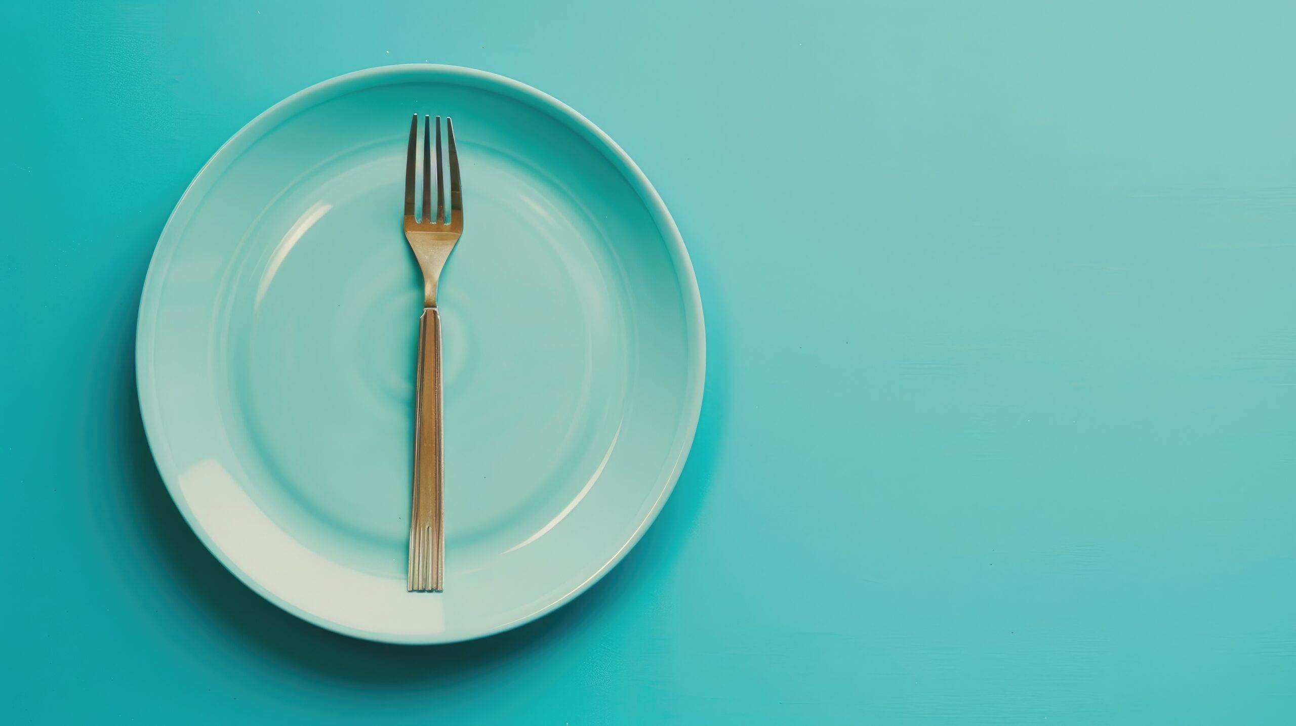 Food insecurity inscription displayed on plate against blue backdrop