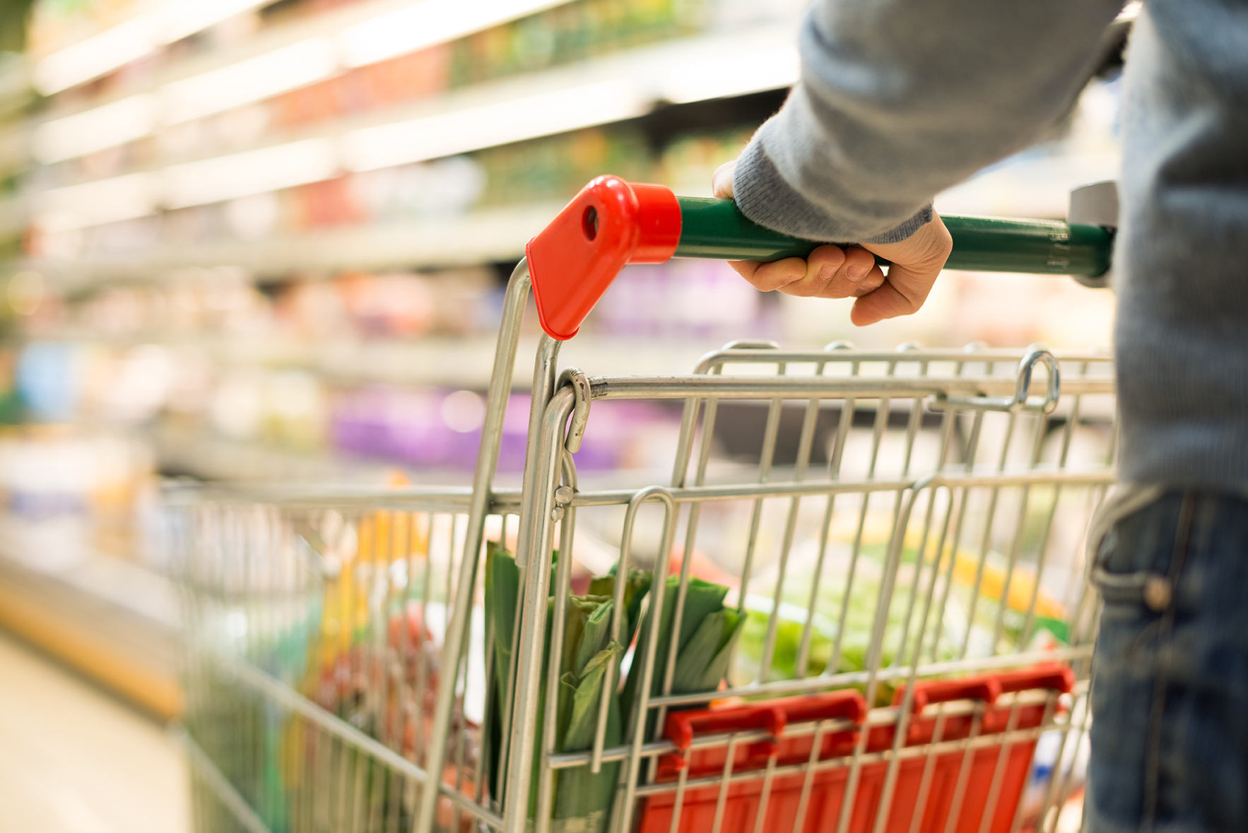 Detail of a man shopping in a supermarket